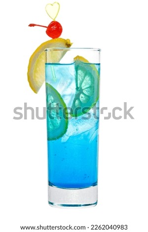 Glass of Blue Lagoon cocktail on white background. Blue cocktail in glass. Alcohol blue margarita or blue hawaian cocktail. Isolated on white background