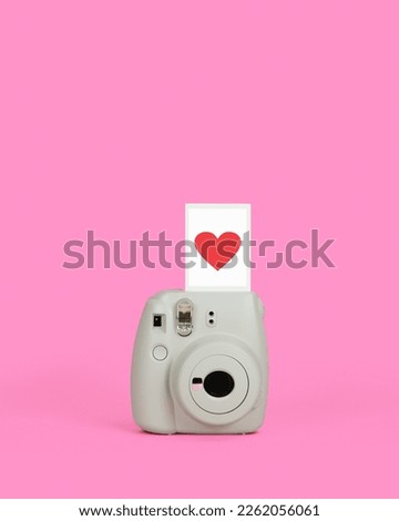 Instant Film Camera with a Red Heart Exposure. Valentine's Day Love with Copy Space.