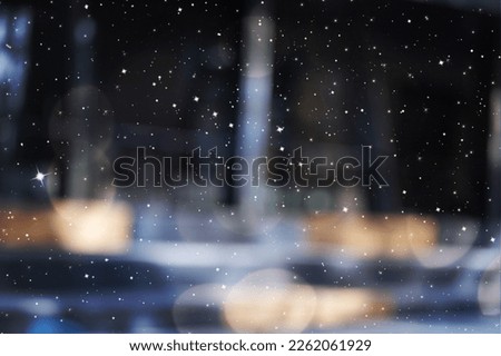 Blurred abstract background of lights and snow Royalty-Free Stock Photo #2262061929