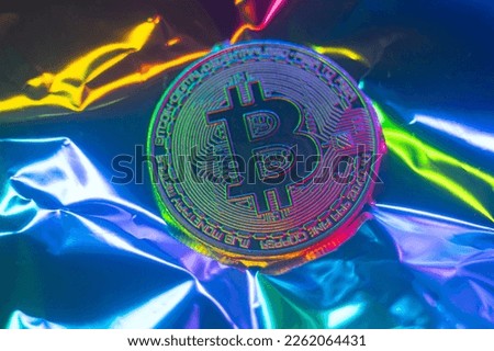 Crypto currency green-golden coin with bitcoin symbol on isolated on metallic background. Bitcoin Coin on black background. Bitcoin cryptocurrency. Cryptocurrency Coin Concept. single golden valuable Royalty-Free Stock Photo #2262064431