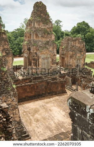 A photo of the remains of towers at the Pre Rup temple site in Cambodia. The picture was taken from about halfway up the main pyramid. 