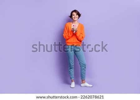Full body length size photo of satisfied beautiful girl hold smartphone use new apple gadget online browsing isolated on purple color background