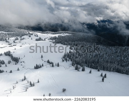 Amazing Aerial winter view of Rila mountain near Belmeken Dam, Bulgaria