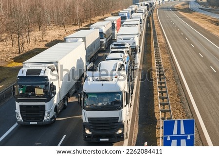 Lorry truck stack in long traffic jam on lane