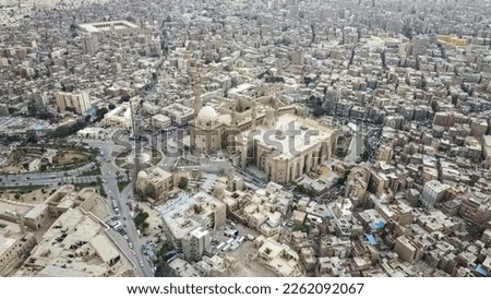 Aerial photos of the Sultan Hassan mosque in Cairo, Egypt, offering a breathtaking view of this magnificient Heritage site making them a must-have addition to any stock footage library.