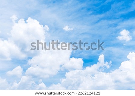 Blue sky and clouds background.