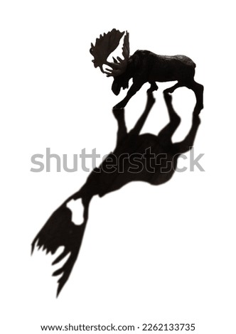 dark side view of baby toy deer,isolated