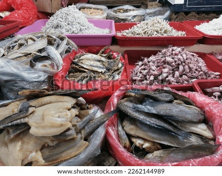 Dry salted cod fish such as kippered herring or dried and salted cod, is fish cured with dry salt and thus preserved for later eating