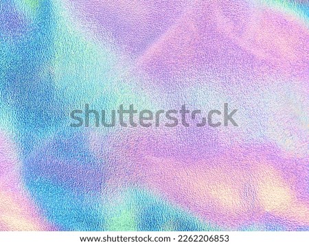 Iridescent texture. Holographic background. Hologram gradient neon color. Foil  Royalty-Free Stock Photo #2262206853