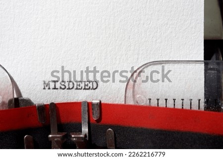 Misdeed word written with a typewriter. Royalty-Free Stock Photo #2262216779