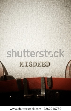 Misdeed word written with a typewriter. Royalty-Free Stock Photo #2262216789