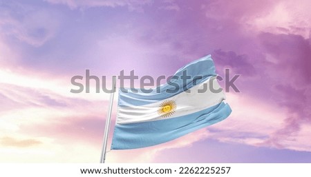 Argentina national flag waving in the sky.