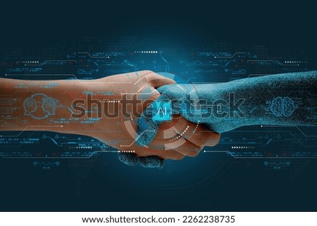 Humans shake hands with AI to show partnership. Machine learning to enable and work together to achieve greater innovation and success. Royalty-Free Stock Photo #2262238735