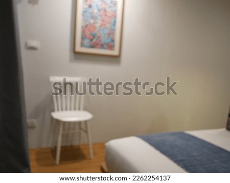 Blur focus of beautiful towel on bed decoration in bedroom.Blur focus of modern bedroom interior background.
