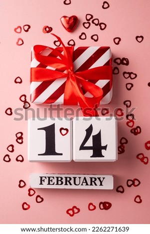 14 February Valentine's Day pink background, gift boxes, red hearts
