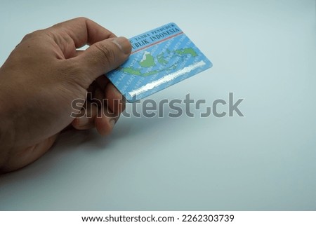 	
ciamis,indonesia- february,15th 2023 : identity card of the resident of the Republic of Indonesia or so-called KTP on white background