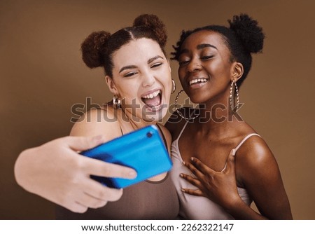 Fashion, selfie and women with phone smile on brown background for wellness, cosmetics and makeup. Friends, beauty and happy girls influencer on smartphone for social media, picture and internet post