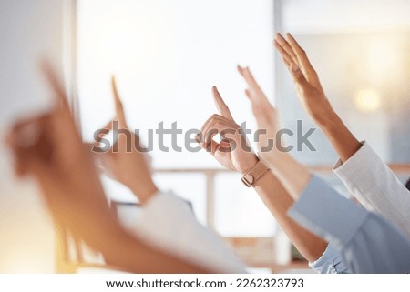 Seminar, diversity and business people raise hands to ask a question at training in the office. Group, multiracial and professional employees at a corporate tradeshow or conference in the workplace. Royalty-Free Stock Photo #2262323793