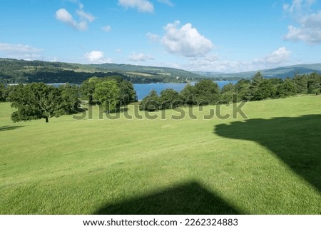 View over Balloch Castle Country Park to Loch Lomond from the John Muir Way walking trail, literally in the shadow of Balloch Castle itself. Loch Lomond and the Trossachs National Park, Scotland.  Royalty-Free Stock Photo #2262324883
