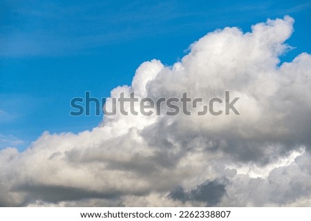 White clouds on a background blue sky