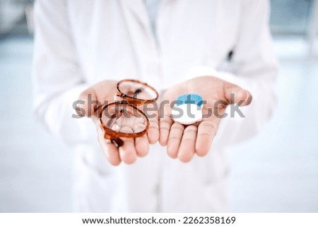 Eye care, choice with glasses or contact lens in hands, closeup and vision with healthcare for eyes. Prescription lenses, person with frame and plastic container, optometry with optician and health Royalty-Free Stock Photo #2262358169