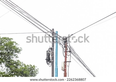Electric power poles with power lines background Royalty-Free Stock Photo #2262368807