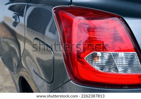 View from behind the taillights of a Datsun car Royalty-Free Stock Photo #2262387813