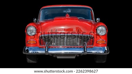 Classic red car front view grill and headlights Royalty-Free Stock Photo #2262398627