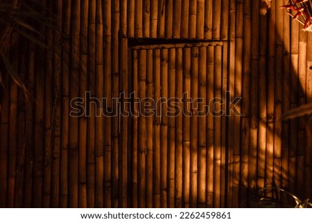 Natural bamboo doors in the evening lights.