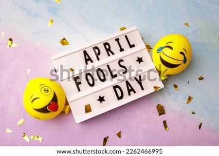 date April 1. Creative concept for April Fools' Day. Festive decor on the blue background. Royalty-Free Stock Photo #2262466995