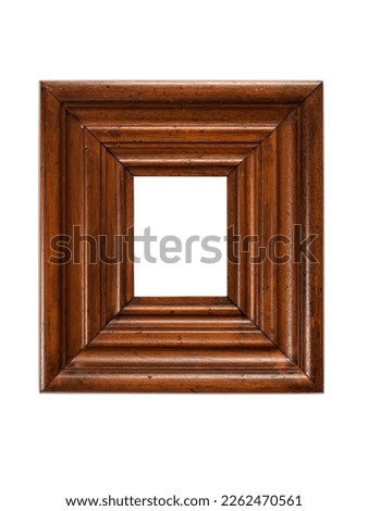 Beautiful old brown wooden picture frame, free standing against white background