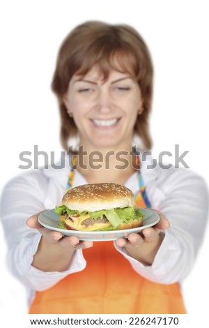 woman holding a burger
