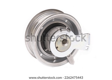 Automobile spare part. Close up repair kit: Tensioner pulley Deflection pulley. close-up on a white background rear view