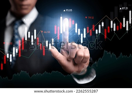 Businessman analyst working with digital finance business data graph showing technology of investment strategy for perceptive financial business decision. Digital economic analysis technology concept. Royalty-Free Stock Photo #2262555287