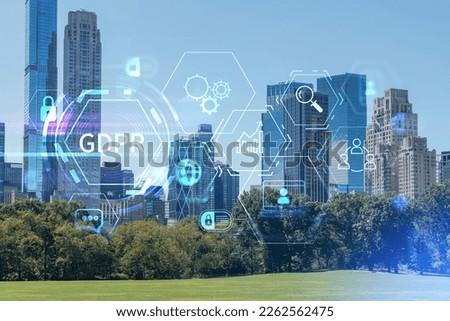 Green lawn at Central Park and Midtown Manhattan skyline skyscrapers at day time, New York City, USA. GDPR hologram, concept of data protection, regulation and privacy for all individuals
