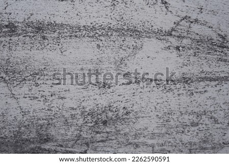 the rough and gritty texture of concrete, straight line