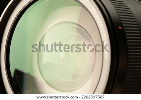 professional camera lens on a black background