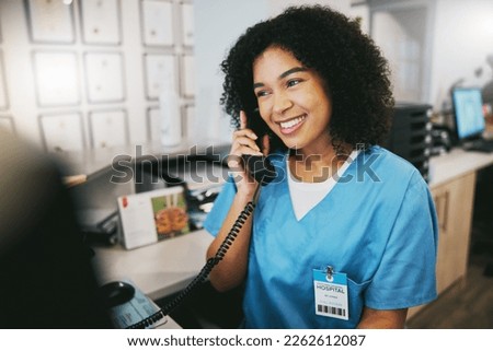 Nurse, phone call and black woman with happiness at doctor office with a smile. Clinic, healthcare worker and networking of a young person happy about work conversation and health insurance talk Royalty-Free Stock Photo #2262612087