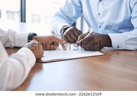 Hand, signature and contract with a business man in a meeting with human resources for performance review. Documents, hiring and recruitment with a male employee signing paperwork in an office