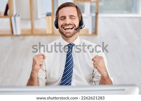 Success, celebration and laugh of business man in call center with happiness from promotion. Happy. consulting and winning achievement of a contact us telemarketing employee excited from bonus