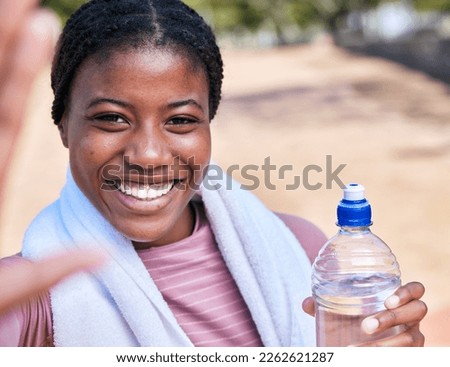 Fitness, selfie portrait and black woman with water for hydration after exercise outdoors. Workout, sports training and face of happy female athlete taking pictures or photo for social media memory.