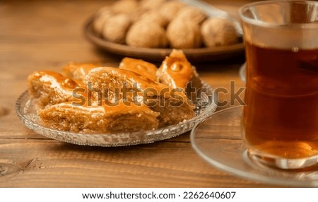 Baklava with nuts on a wooden background. Selective focus. food and drink.