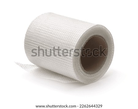 Roll of fiberglass self-adhesive mesh tape isolated on white Royalty-Free Stock Photo #2262644329