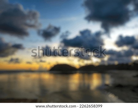 Blurred background of Balekambang beach scenery at sunset