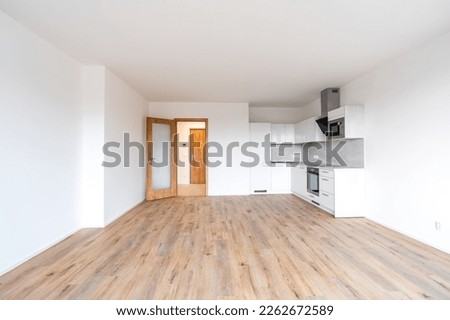 new empty room with kitchen in residential house