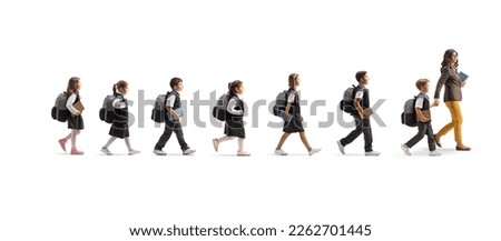 Teacher crossing a street with schoolchildren on a crosswalk isolated on white background





