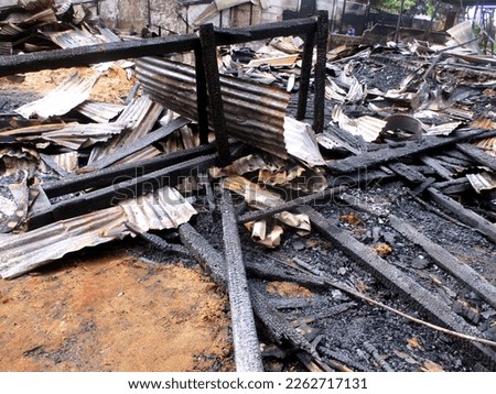 a condition of a building that has been completely burnt by fire