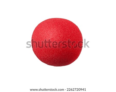 Red clown nose made of rubber foam, isolated Royalty-Free Stock Photo #2262720941