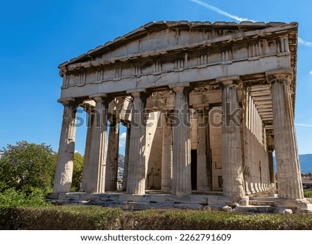 Scenic view of the temple of Hephaestus and Athena Ergane Agora, Athens, Attica, Greece, Europe. Ruins of ancient agora, birthplace of democracy and civilisation. Building dedicated to greek gods Royalty-Free Stock Photo #2262791609