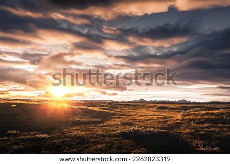 Beautiful panorama of the amazing volcanic mossy landscape of Iceland at sunrise with colorful dramatic sky. Picture of wild area. amazimg nature background